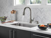 Single Handle Pull-Down Kitchen Faucet with Soap Dispenser and ShieldSpray® Technology